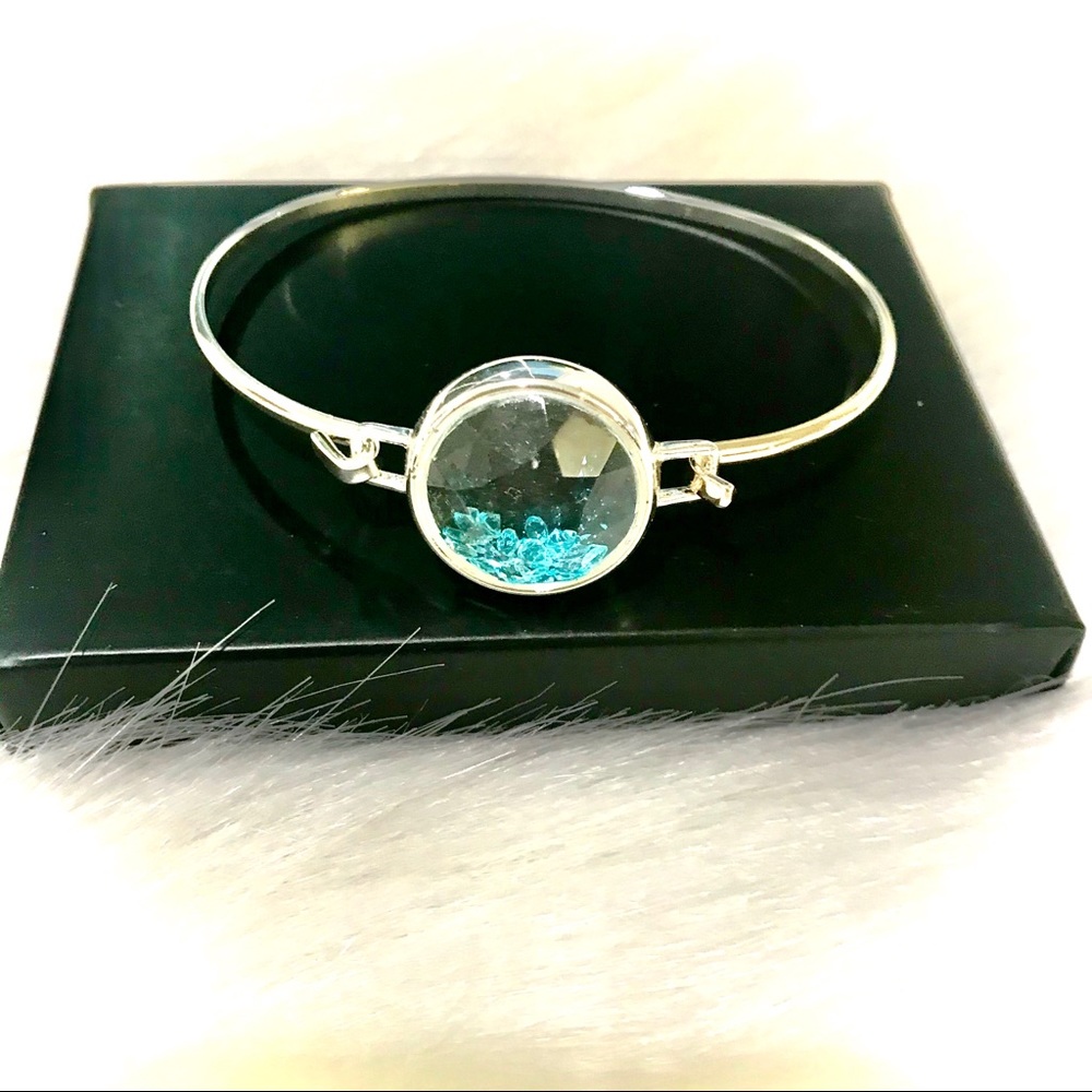 SILVER TONED BRACELET WITH BEAUTIFUL AQUA GEMS PIECES